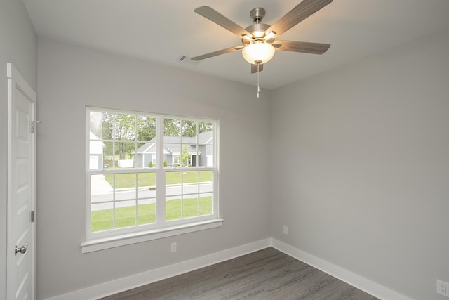 302 Fieldstone Ln, Springfield, TN 37172 - unfurnished room with ceiling fan, dark wood-style floors, and baseboards