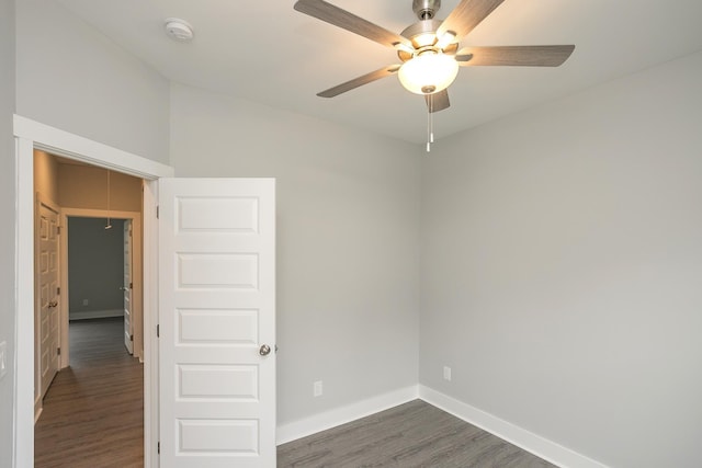 302 Fieldstone Ln, Springfield, TN 37172 - spare room with a smoke detector, dark wood-type flooring, baseboards, and ceiling fan