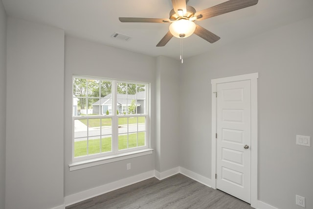 302 Fieldstone Ln, Springfield, TN 37172 - unfurnished room featuring plenty of natural light, wood finished floors, a ceiling fan, and baseboards