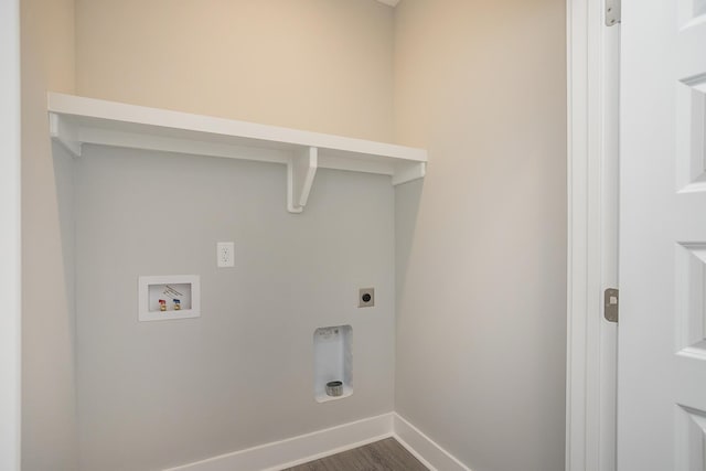 302 Fieldstone Ln, Springfield, TN 37172 - laundry area featuring electric dryer hookup, washer hookup, baseboards, and dark wood-type flooring