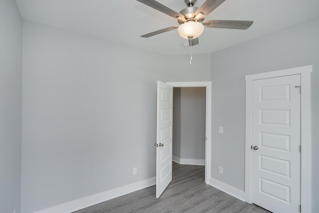 340 Fieldstone Ln, Springfield, TN 37172 - unfurnished bedroom with wood finished floors, baseboards, and ceiling fan