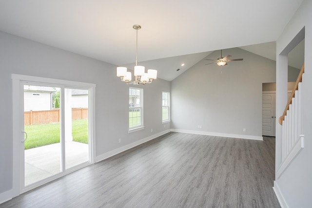 340 Fieldstone Ln, Springfield, TN 37172 - empty room with healthy amount of natural light, wood finished floors, a chandelier, a ceiling fan, and vaulted ceiling