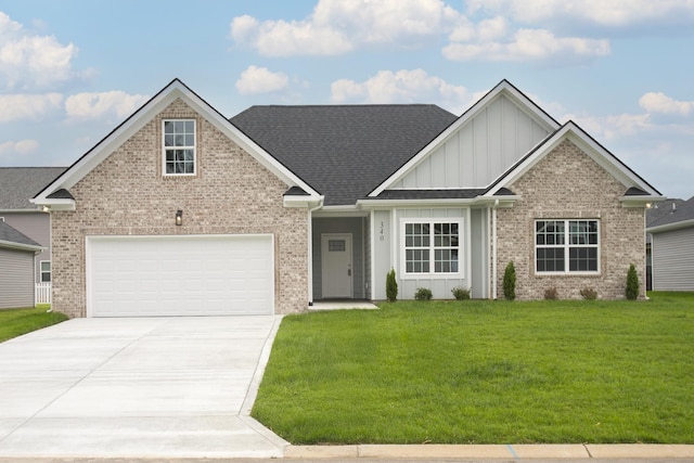 340 Fieldstone Ln, Springfield, TN 37172 - view of front of home with board and batten siding, a front lawn, concrete driveway, and brick siding