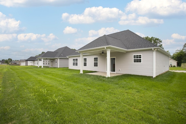 340 Fieldstone Ln, Springfield, TN 37172 - rear view of house featuring a patio, a yard, a shingled roof, and ceiling fan