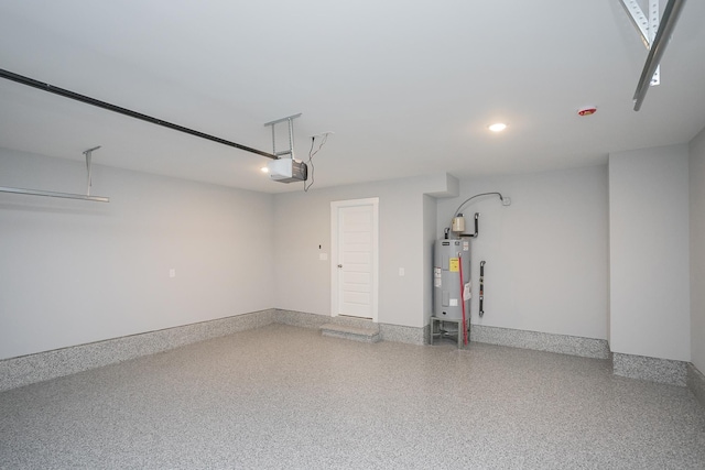 340 Fieldstone Ln, Springfield, TN 37172 - garage with electric water heater, a garage door opener, and recessed lighting