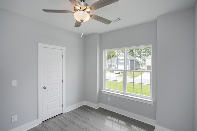 340 Fieldstone Ln, Springfield, TN 37172 - unfurnished room featuring healthy amount of natural light, baseboards, and wood finished floors