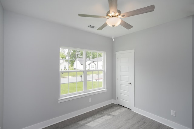 340 Fieldstone Ln, Springfield, TN 37172 - spare room with plenty of natural light, baseboards, wood finished floors, and a ceiling fan