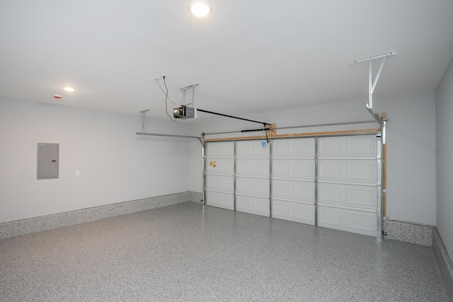 340 Fieldstone Ln, Springfield, TN 37172 - garage with electric panel, a garage door opener, baseboards, and recessed lighting