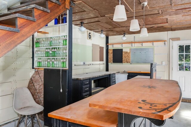 207 Cumberland Cir, Nashville, TN 37214 - kitchen with wood counters and concrete floors