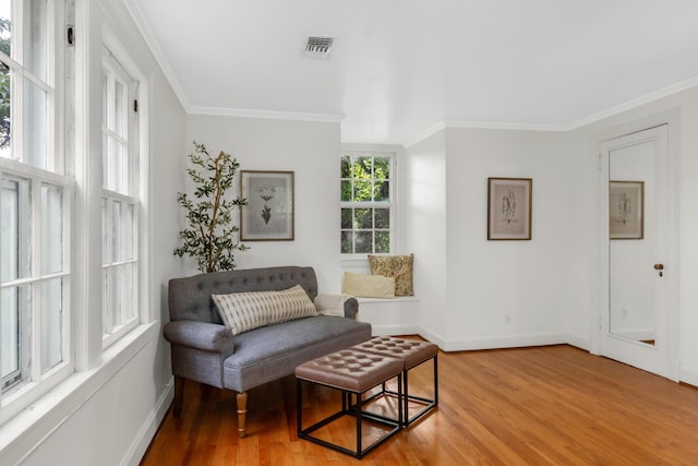 207 Cumberland Cir, Nashville, TN 37214 - sitting room with wood finished floors, baseboards, and crown molding