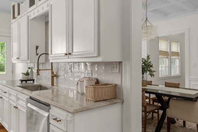 207 Cumberland Cir, Nashville, TN 37214 - kitchen featuring stainless steel dishwasher, a sink, tasteful backsplash, white cabinets, and light stone countertops