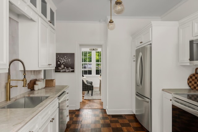 207 Cumberland Cir, Nashville, TN 37214 - kitchen featuring stainless steel appliances, a sink, white cabinetry, light stone counters, and glass insert cabinets