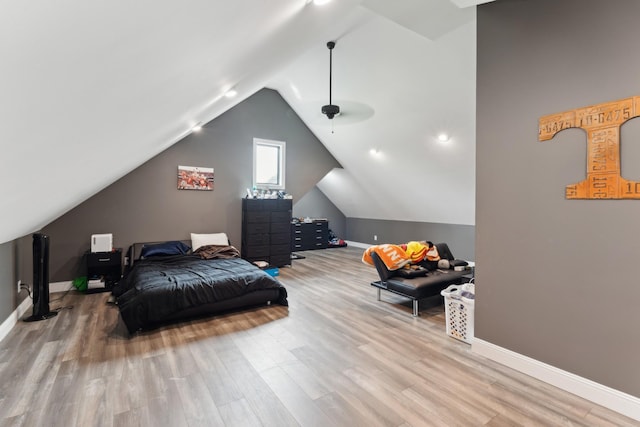 468 Olin Bean Rd, Red Boiling Springs, TN 37150 - bedroom featuring wood finished floors, vaulted ceiling, and baseboards