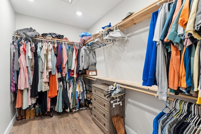468 Olin Bean Rd, Red Boiling Springs, TN 37150 - walk in closet with wood finished floors and attic access