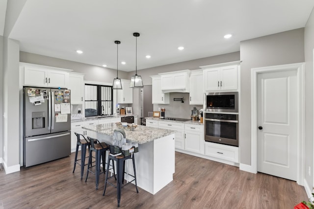468 Olin Bean Rd, Red Boiling Springs, TN 37150 - kitchen featuring stainless steel appliances, a sink, white cabinetry, and recessed lighting