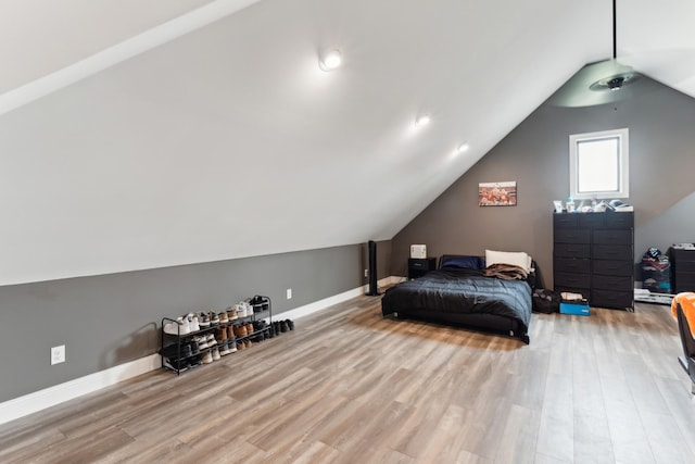 468 Olin Bean Rd, Red Boiling Springs, TN 37150 - bedroom featuring wood finished floors, lofted ceiling, and baseboards