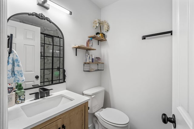 304 Hank Aaron Cv, La Vergne, TN 37086 - bathroom featuring toilet, vanity, and a tile shower