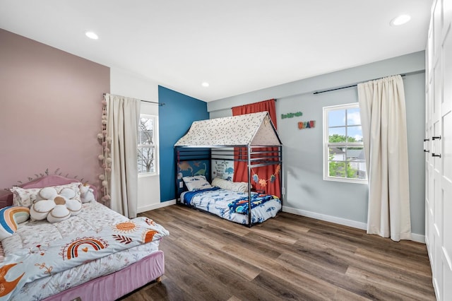 304 Hank Aaron Cv, La Vergne, TN 37086 - bedroom with wood finished floors, baseboards, and recessed lighting