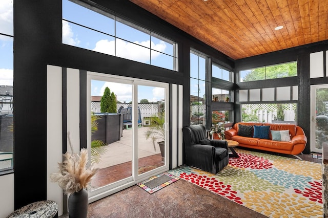 304 Hank Aaron Cv, La Vergne, TN 37086 - sunroom featuring an outdoor hangout area, a high ceiling, plenty of natural light, and wood ceiling