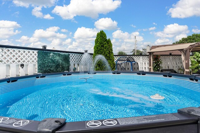 304 Hank Aaron Cv, La Vergne, TN 37086 - view of swimming pool with a gazebo