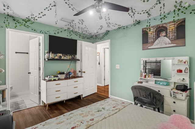 304 Hank Aaron Cv, La Vergne, TN 37086 - bedroom featuring baseboards, wood finished floors, an office area, and a ceiling fan