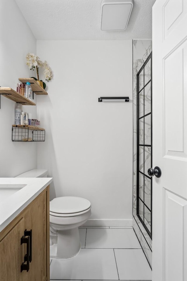 304 Hank Aaron Cv, La Vergne, TN 37086 - full bath with a stall shower, vanity, toilet, tile patterned floors, and a textured ceiling