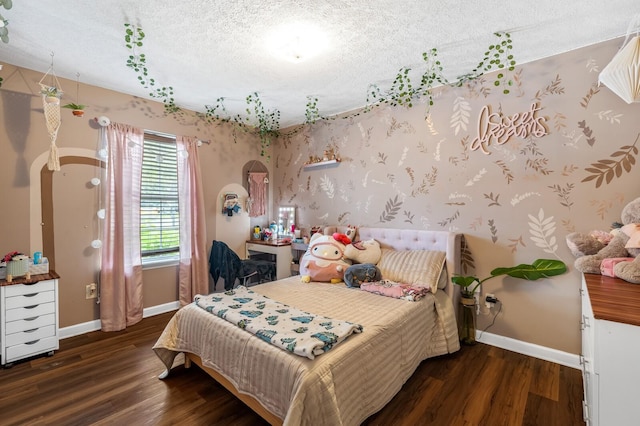304 Hank Aaron Cv, La Vergne, TN 37086 - bedroom with baseboards, wood finished floors, and a textured ceiling