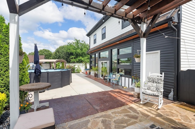 304 Hank Aaron Cv, La Vergne, TN 37086 - view of patio with a jacuzzi and a pergola