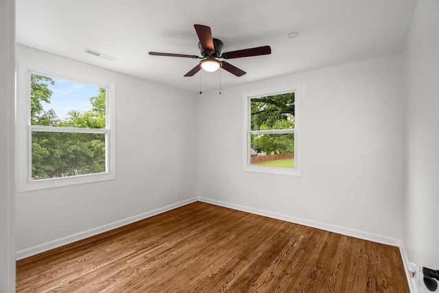 2607 Mashburn Ct, Nashville, TN 37210 - unfurnished room with healthy amount of natural light, wood finished floors, baseboards, and ceiling fan