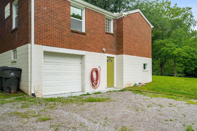 2607 Mashburn Ct, Nashville, TN 37210 - view of front of property with an attached garage and brick siding