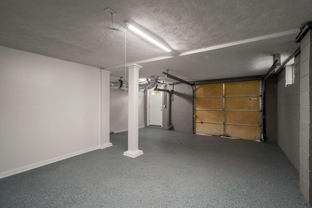 2607 Mashburn Ct, Nashville, TN 37210 - garage featuring concrete block wall
