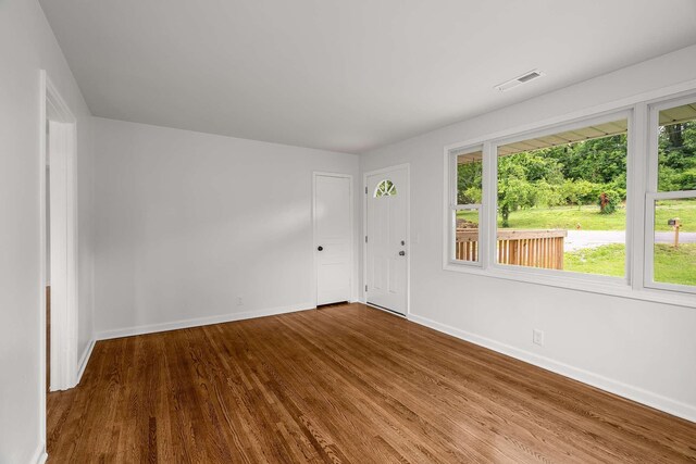 2607 Mashburn Ct, Nashville, TN 37210 - empty room featuring wood finished floors, baseboards, and healthy amount of natural light
