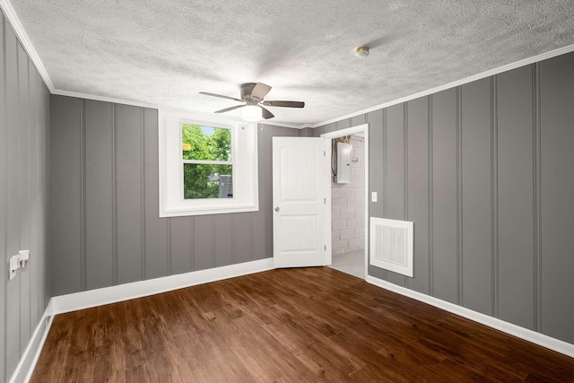 2607 Mashburn Ct, Nashville, TN 37210 - unfurnished room featuring a decorative wall, wood finished floors, ceiling fan, a textured ceiling, and ornamental molding