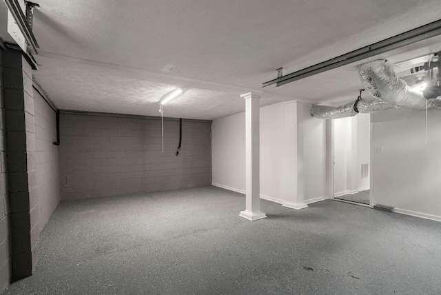 2607 Mashburn Ct, Nashville, TN 37210 - finished basement featuring concrete block wall, a textured ceiling, and baseboards