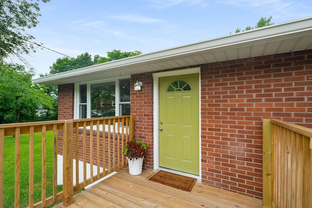 2607 Mashburn Ct, Nashville, TN 37210 - view of exterior entry featuring brick siding and a yard