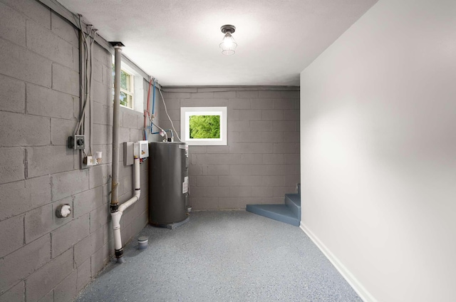 2607 Mashburn Ct, Nashville, TN 37210 - basement featuring electric water heater and concrete block wall