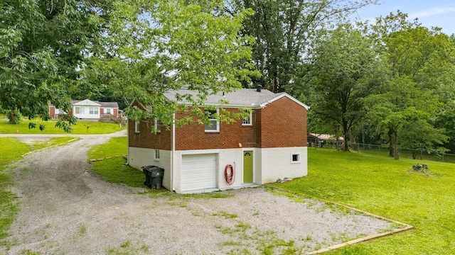 2607 Mashburn Ct, Nashville, TN 37210 - view of side of home with dirt driveway, brick siding, and a garage
