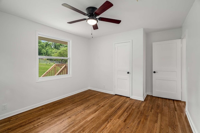 2607 Mashburn Ct, Nashville, TN 37210 - unfurnished bedroom featuring wood finished floors, baseboards, and a ceiling fan