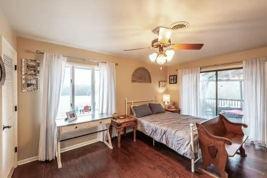 126 Harsh Ln, Castalian Springs, TN 37031 - bedroom featuring access to outside, dark wood-type flooring, and a ceiling fan