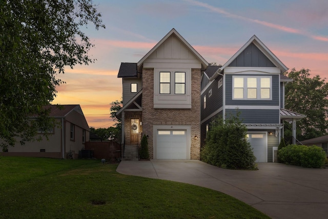 423A American Rd, Nashville, TN 37209 - view of front of home with driveway, board and batten siding, and a garage