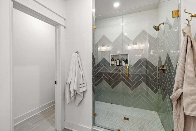 423A American Rd, Nashville, TN 37209 - bathroom featuring baseboards, a shower stall, and recessed lighting