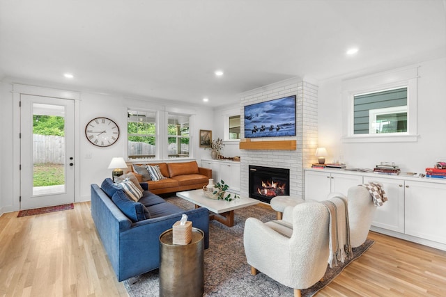 423A American Rd, Nashville, TN 37209 - living area featuring plenty of natural light, light wood-style flooring, a fireplace, and recessed lighting