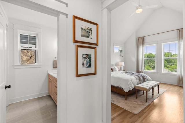 423A American Rd, Nashville, TN 37209 - bedroom with vaulted ceiling, light wood-style floors, baseboards, and a ceiling fan