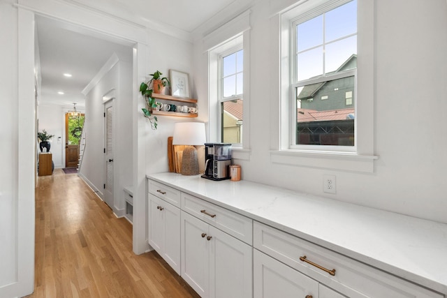 423A American Rd, Nashville, TN 37209 - corridor with plenty of natural light, light wood-style floors, crown molding, and recessed lighting