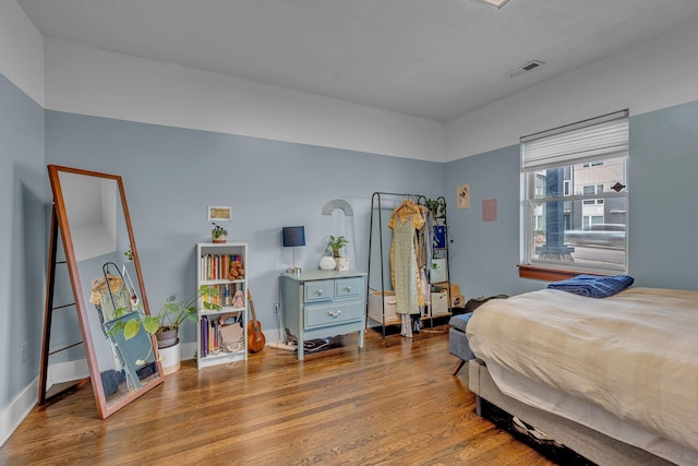 1049 E Trinity Ln, Nashville, TN 37216 - bedroom with wood finished floors and baseboards