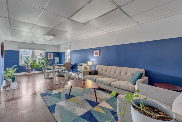 1049 E Trinity Ln, Nashville, TN 37216 - living room with a drop ceiling, wood finished floors, and baseboards