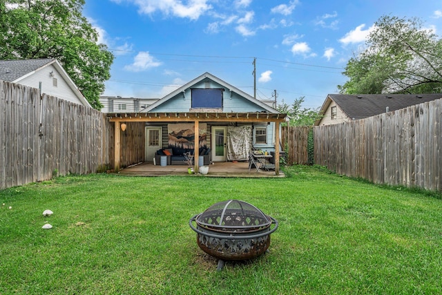 1049 E Trinity Ln, Nashville, TN 37216 - rear view of property with an outdoor fire pit