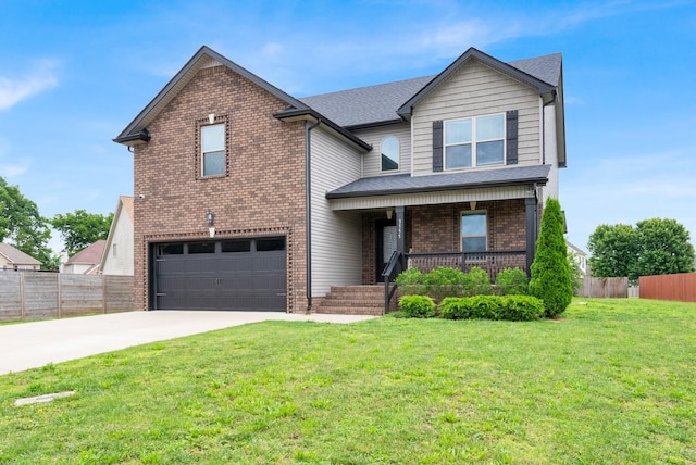 3555 Neena Ct, Clarksville, TN 37042 - view of front of property with an attached garage, covered porch, driveway, and brick siding