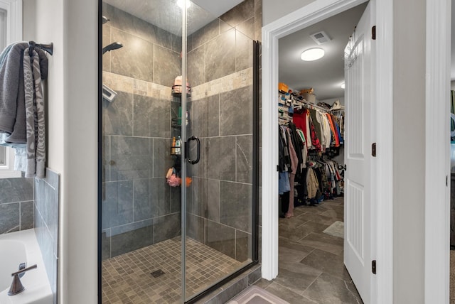 3555 Neena Ct, Clarksville, TN 37042 - full bathroom with a stall shower, a spacious closet, and a bath