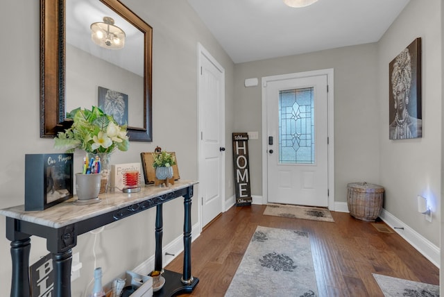 3555 Neena Ct, Clarksville, TN 37042 - foyer featuring dark wood finished floors and baseboards